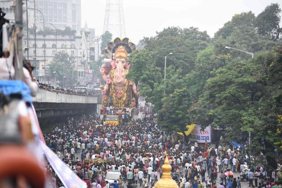 The immersion of Ganesh idols was underway in Hyderabad on Thursday with religious fervour and amid rain and tight security. Maha Ganapathi,Maha Ganapathi immersion,Maha Ganapathi immersion in Hyderabad,Ganapathi immersion in Hyderabad,Ganesh Visarjan,Ganesh Visarjan in Hyderabad,Ganesh Visarjan pics,Ganesh Visarjan images,Ganesh Visarjan photos,Ganesh Visarjan pictures