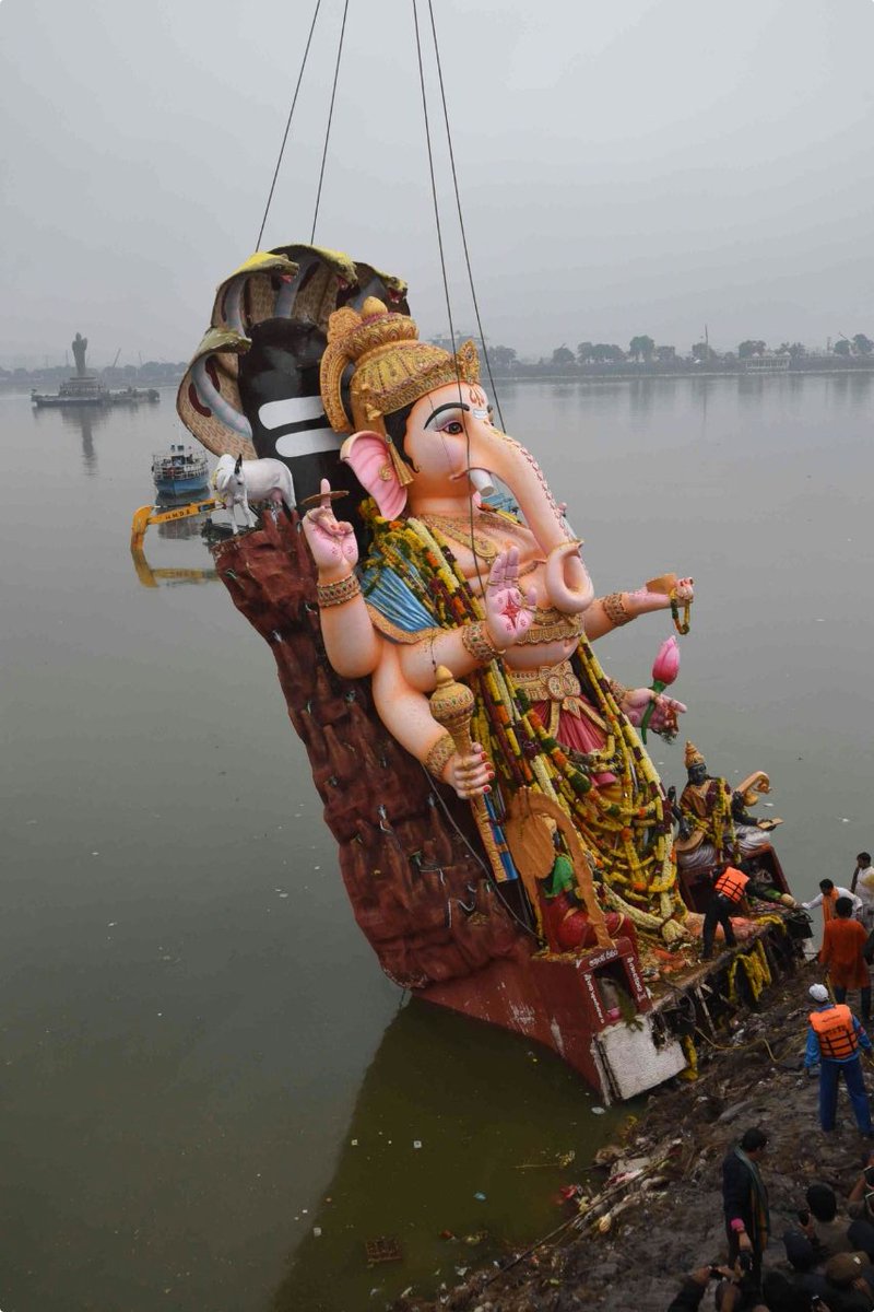The immersion of Ganesh idols was underway in Hyderabad on Thursday with religious fervour and amid rain and tight security. Maha Ganapathi,Maha Ganapathi immersion,Maha Ganapathi immersion in Hyderabad,Ganapathi immersion in Hyderabad,Ganesh Visarjan,Ganesh Visarjan in Hyderabad,Ganesh Visarjan pics,Ganesh Visarjan images,Ganesh Visarjan photos,Ganesh Visarjan pictures