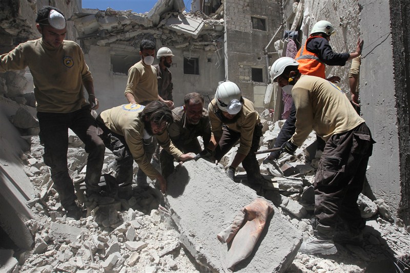 Volunteers of Syria's civil defense teams are often first on the scene to the chaos of civil war. White Helmets,White Helmets of Syria,Syria,civil war,Syria civil defense teams,civil defense teams