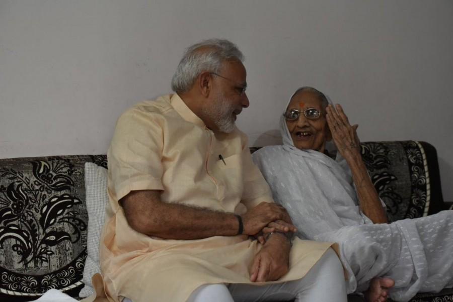 Prime Minister Narendra Modi on Saturday celebrated his 66th birthday with his mother Hira Ba in Gandhinagar, Gujarat. Narendra Modi,Modi celebrates birthday with his mother,Narendra Modi mother,Modi mother,Narendra Modi birthday,PM Modi,Narendra Modi birthday celebrations,Narendra Modi birthday pics,Narendra Modi birthday images,Narendra Modi birthday photos,Narendra Mod