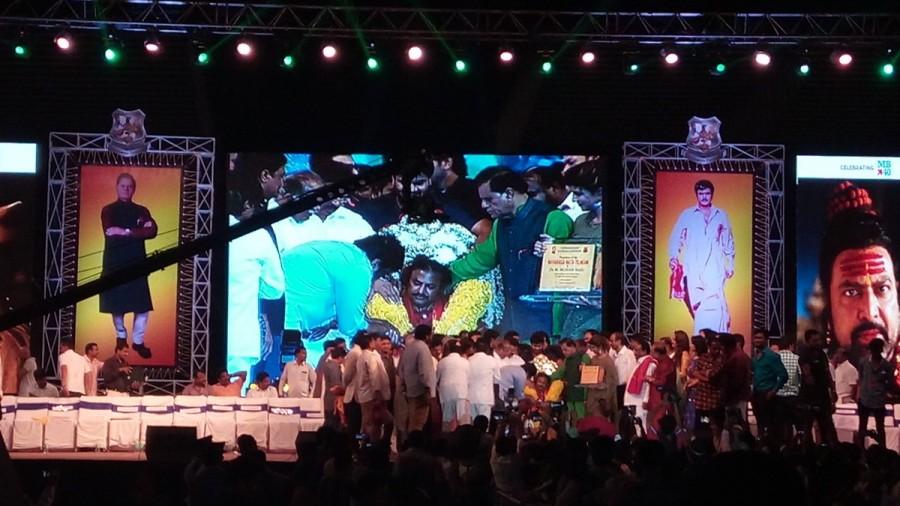 Telugu Actor Mohan Babu 40 Years Celebration event held in Vizag. Celebs like Chiranjeevi, Venkatesh, Charmi, KJ Yesudas, T Subbarami Reddy, Manchu Vishnu, Manchu Lakshmi, Manoj, Sridevi, Boney Kapoor, Dasari Narayana Rao, Allu Sirish, Brahmanandam, Sunil, Raghu Babu, Paruchuri Gopalakrishna, Ali, Posani Krishna Murali, Raja Ravindra, Pranathi Reddy, Nirmala Devi, D Suresh Babu, Viranica Manchu, Nagababu, PJ Kurien, B Gopal, Jhansi, Raj Tarun, HD Kumaraswamy, K Raghavendra Rao, Ravi Raja Pinisetty, Nikhil Siddharth, Pragya Jaiswal, Mani Sharma, Sai Dharam Tej, Allu Aravind and others graced the event. Chiranjeevi,Venkatesh,Mohan Babu 40,Mohan Babu,Mohan Babu 40 years,Chiranjeevi,Venkatesh,Charmi,KJ Yesudas,T Subbarami Reddy,Manchu Vishnu,Manchu Lakshmi,Manoj,Sridevi,Boney Kapoor,Dasari Narayana Rao,Allu Sirish,Brahmanandam,Sunil,Raghu Babu