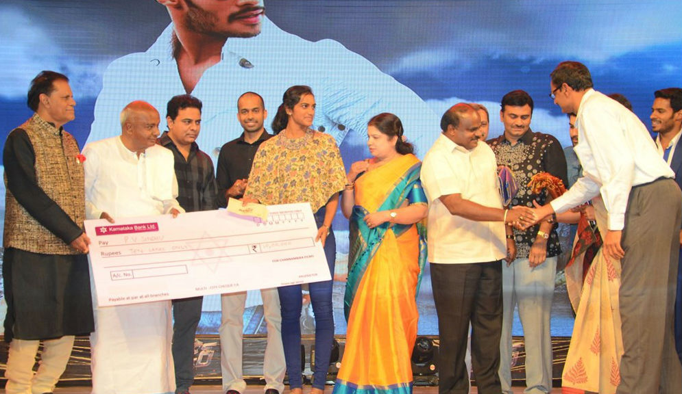 Telugu Movie Jaguar music launch held in Hyderabad. Celebs like Nikhil Kumar Gowda, Deepti Sati, HD Deve Gowda, Anitha Kumaraswamy, HD Kumaraswamy, PV Sindhu, Pullela Gopichand, Mahadev, Manoj Paramahamsa, S Thaman, Ruben, T Subbarami Reddy, KT Rama Rao, Jagapathi Babu, Brahmanandam, D Suresh Babu, KV Vijayendra Prasad, Suma, Raghu Babu, Tammareddy Bharadwaja, V. Chamundeswaranath, KL Damodar Prasad, C Kalyan, Ram Laxman, Vamsy, Ramajogayya Sastry, Chethan Kumar, Kolla Ashok Kumar and others graced the event. Jaguar Music launch,Jaguar Music,Jaguar audio,Jaguar audio launch,Jaguar audio launch pics,Jaguar audio launch images,Jaguar audio launch photos,Jaguar audio launch stills,Jaguar audio launch pictures