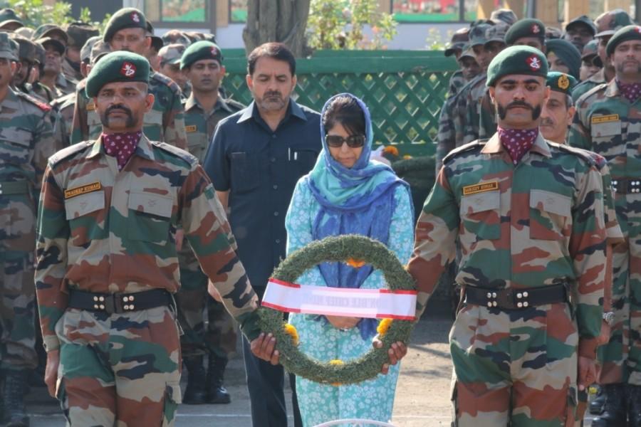 Jammu and Kashmir Chief Minister Mehbooba Mufti lays wreath at the mortal remains of martyrs of Uri terror attack, in Srinagar on Sept 19, 2016. Uri Terror Attack,Uri Terror,Uri Attack,ceremony of martyrs of Uri Terror Attack,ceremony of martyrs,ceremony of Uri Terror Attack,ceremony of Uri Attack,Wreath laying ceremony