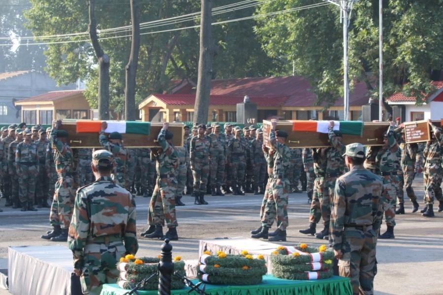 Jammu and Kashmir Chief Minister Mehbooba Mufti lays wreath at the mortal remains of martyrs of Uri terror attack, in Srinagar on Sept 19, 2016. Uri Terror Attack,Uri Terror,Uri Attack,ceremony of martyrs of Uri Terror Attack,ceremony of martyrs,ceremony of Uri Terror Attack,ceremony of Uri Attack,Wreath laying ceremony