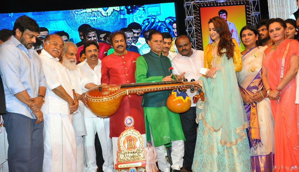 Telugu Actor Mohan Babu 40 Years Celebration event held in Vizag. Celebs like Chiranjeevi, Venkatesh, Charmi, KJ Yesudas, T Subbarami Reddy, Manchu Vishnu, Manchu Lakshmi, Manoj, Sridevi, Boney Kapoor, Dasari Narayana Rao, Allu Sirish, Brahmanandam, Sunil, Raghu Babu, Paruchuri Gopalakrishna, Ali, Posani Krishna Murali, Raja Ravindra, Pranathi Reddy, Nirmala Devi, D Suresh Babu, Viranica Manchu, Nagababu, PJ Kurien, B Gopal, Jhansi, Raj Tarun, HD Kumaraswamy, K Raghavendra Rao, Ravi Raja Pinisetty, Nikhil Siddharth, Pragya Jaiswal, Mani Sharma, Sai Dharam Tej, Allu Aravind and others graced the event. Chiranjeevi,Venkatesh,Mohan Babu 40,Mohan Babu,Mohan Babu 40 years,Chiranjeevi,Venkatesh,Charmi,KJ Yesudas,T Subbarami Reddy,Manchu Vishnu,Manchu Lakshmi,Manoj,Sridevi,Boney Kapoor,Dasari Narayana Rao,Allu Sirish,Brahmanandam,Sunil,Raghu Babu