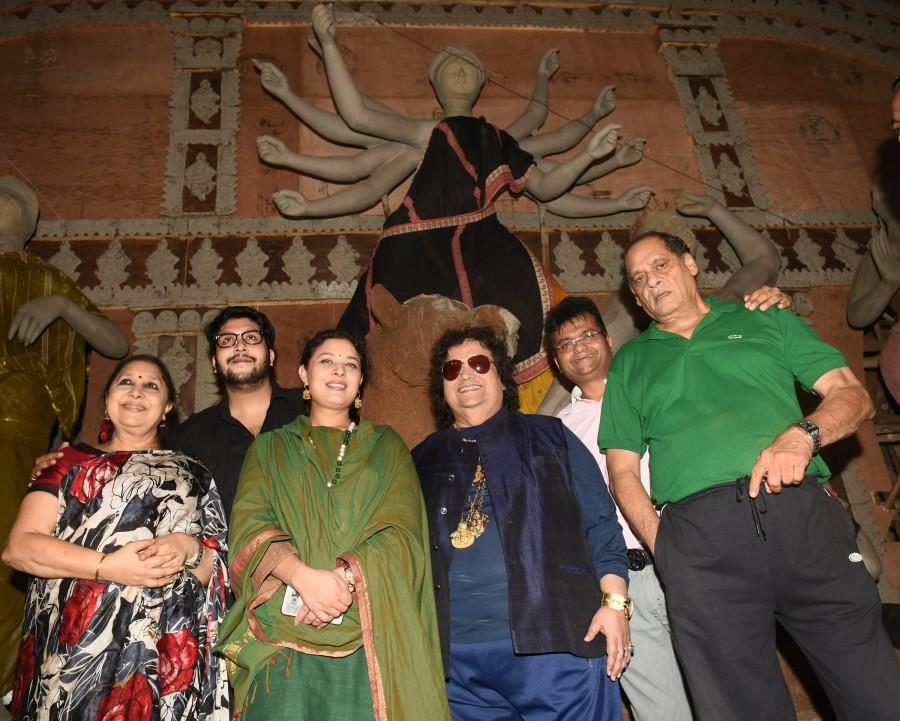 At the unveiling of the murti present were Bhappi Lahiri, Mrs.Shamita Mukherji, Bappa Lahari, Debu Mukherji, Aneel Murarka* and the Making Murti ceremony of Maa Durga's idol 17' feet tall and 50 ton weight which will be installed (Sthapana) and only murti to be fork lifted ,at one of those biggest and oldest Pujas in Mumbai- North Bombay Sarbojanin Durga Puja Samiti 2016. Durga Puja Samiti 2016,Durga Puja Samiti,Durga Puja,Bhappi Lahiri,Shamita Mukherji,Bappa Lahari,Debu Mukherji,Aneel Murarka,Maa Durga
