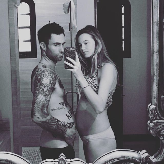 Singer Adam Levine and wife Behati Prinsloo have shared the first photograph of their newborn daughter online. Adam Levine,Behati Prinsloo,Adam Levine and Behati Prinsloo,Adam Levine daughter,Behati Prinsloo daughter,Adam Levine shares photo of newborn daughter,Behati Prinsloo shares photo of newborn daughter,newborn daughter