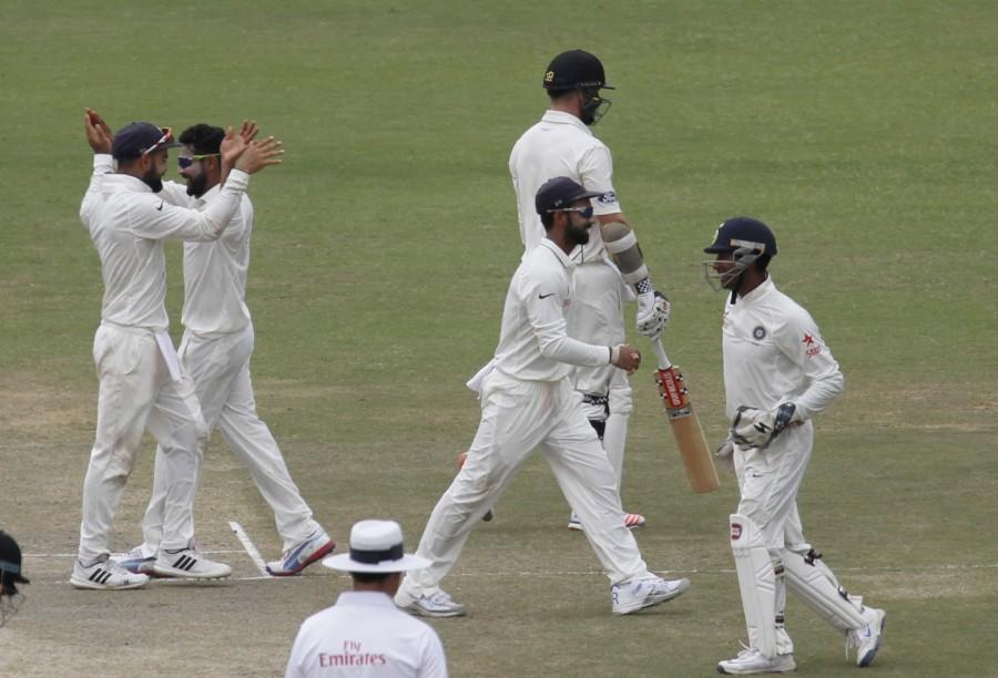 Riding on Ravichandran Ashwin and Ravindra Jadeja's brilliant bowling, New Zealand were bundled out by hosts India for 262 on the third day of the first Test at the Green Park stadium here on Saturday. New Zealand vs India,India vs New Zealand,India vs New Zealand Test series,New Zealand all out for 262,India leads by 56 runs,Ravichandran Ashwin,Ravindra Jadeja