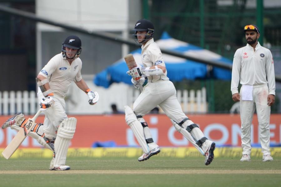 Riding on Ravichandran Ashwin and Ravindra Jadeja's brilliant bowling, New Zealand were bundled out by hosts India for 262 on the third day of the first Test at the Green Park stadium here on Saturday. New Zealand vs India,India vs New Zealand,India vs New Zealand Test series,New Zealand all out for 262,India leads by 56 runs,Ravichandran Ashwin,Ravindra Jadeja