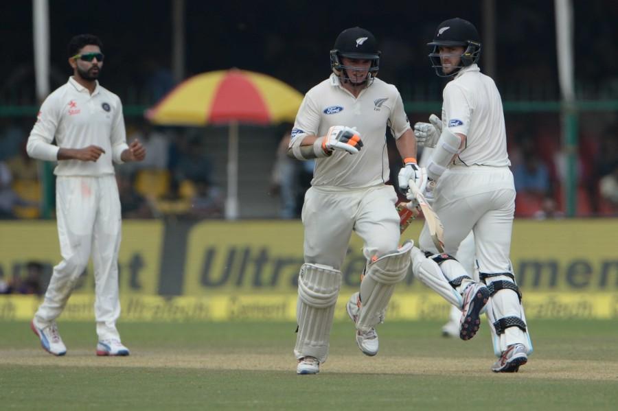Riding on Ravichandran Ashwin and Ravindra Jadeja's brilliant bowling, New Zealand were bundled out by hosts India for 262 on the third day of the first Test at the Green Park stadium here on Saturday. New Zealand vs India,India vs New Zealand,India vs New Zealand Test series,New Zealand all out for 262,India leads by 56 runs,Ravichandran Ashwin,Ravindra Jadeja