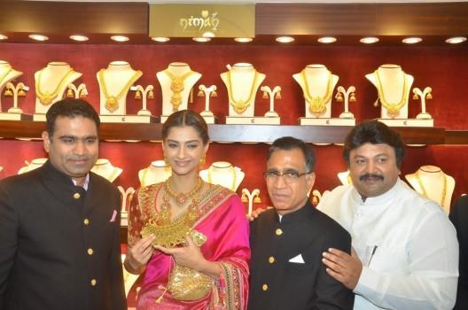 Bollywood Actress Sonam Kapoor and South Indian actor Prabhu Ganesan inaugurated Kalyan Jewellers Anna Nagar Showroom in Chennai. Actress Sonam Kapoor spotted in pink Banarasi silk embroidered saree by Abu Jani Sandeep Khosla.