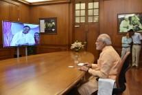 PM Narendra Modi interacts with Mata Amritanandamayi 'Amma' through video conferencing.