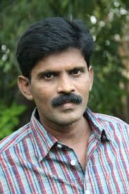 Tamil Cinema just lost another Gem. Lyricist Annamalai passed away due to heart attack. His famous Lyricist are Nenjorathil (Pichaikaran), En Uchi Mandaila (Vettaikaran) and Ulaginil Miga Uyaram (Naan) etc... Lyricist Annamalai,Lyricist Annamalai Passed away,Annamalai Passed away,Lyricist Annamalai dead,Lyricist Annamalai death