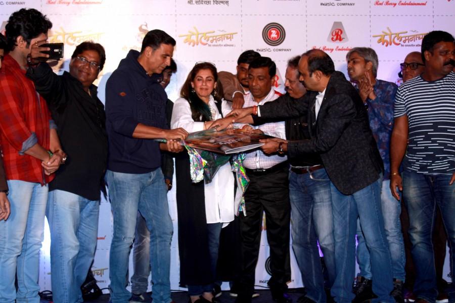 Bollywood actor Akshay Kumar and Dimple Kapadia with star cast during the music launch of Marathi film Kaul Manacha. Akshay Kumar,Dimple Kapadia,Akshay Kumar and Dimple Kapadia,Marathi film Kaul Manacha,Kaul Manacha,Kaul Manacha music,Kaul Manacha music launch,Kaul Manacha audio