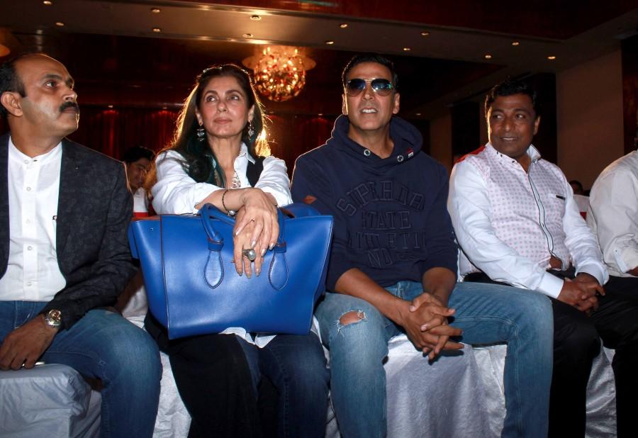 Bollywood actor Akshay Kumar and Dimple Kapadia with star cast during the music launch of Marathi film Kaul Manacha. Akshay Kumar,Dimple Kapadia,Akshay Kumar and Dimple Kapadia,Marathi film Kaul Manacha,Kaul Manacha,Kaul Manacha music,Kaul Manacha music launch,Kaul Manacha audio