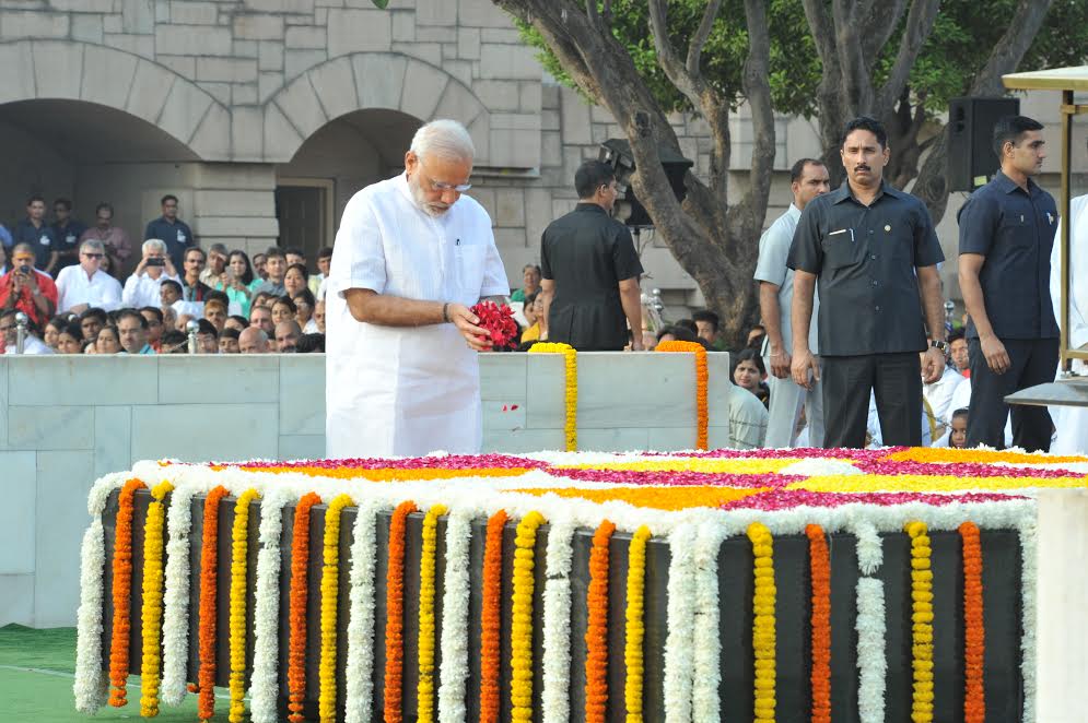 Prime Minister Narendra Modi on Sunday paid tribute to Mahatma Gandhi and Lal Bahadur Shastri at Rajghat and Vijay Ghat respectively on their birth anniversaries. The Prime Minister remembered the two leaders for the values they championed. Gandhi Jayanti,Gandhi Jayanti 2016,Narendra Modi pays tributes to Gandhi,Narendra Modi,PM Narendra Modi,Modi,Gandhi Jayanti at Rajghat,Gandhi Jayanti celebrations