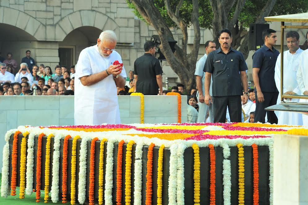 Prime Minister Narendra Modi on Sunday paid tribute to Mahatma Gandhi and Lal Bahadur Shastri at Rajghat and Vijay Ghat respectively on their birth anniversaries. The Prime Minister remembered the two leaders for the values they championed. Gandhi Jayanti,Gandhi Jayanti 2016,Narendra Modi pays tributes to Gandhi,Narendra Modi,PM Narendra Modi,Modi,Gandhi Jayanti at Rajghat,Gandhi Jayanti celebrations