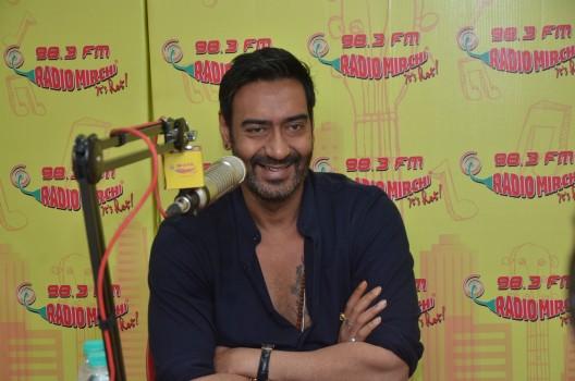 Photos of Bollywood actor Ajay Devgan at Radio Mirchi for the promotion of Shivaay.