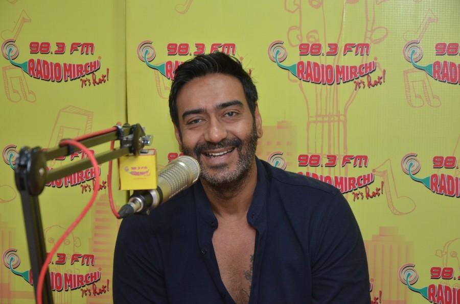 Photos of Bollywood actor Ajay Devgan at Radio Mirchi for the promotion of Shivaay. Ajay Devgan,Ajay Devgan at Radio Mirchi,Ajay Devgan promotes Shivaay,Shivaay,Shivaay promotion,Shivaay movie promotion,Ajay Devgan pics,Ajay Devgan images,Ajay Devgan stills,Ajay Devgan pictures,Ajay Devgan photos