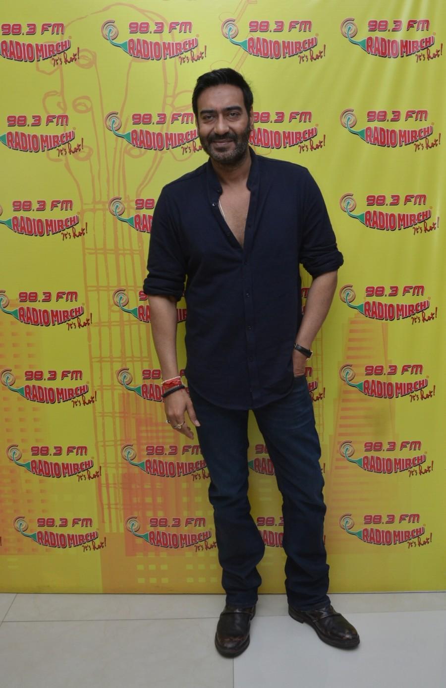 Photos of Bollywood actor Ajay Devgan at Radio Mirchi for the promotion of Shivaay. Ajay Devgan,Ajay Devgan at Radio Mirchi,Ajay Devgan promotes Shivaay,Shivaay,Shivaay promotion,Shivaay movie promotion,Ajay Devgan pics,Ajay Devgan images,Ajay Devgan stills,Ajay Devgan pictures,Ajay Devgan photos