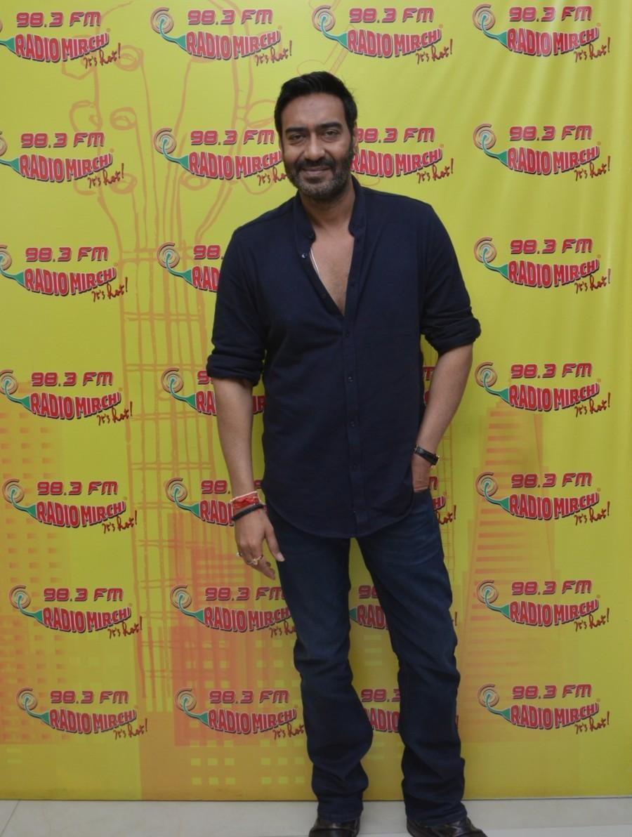 Photos of Bollywood actor Ajay Devgan at Radio Mirchi for the promotion of Shivaay. Ajay Devgan,Ajay Devgan at Radio Mirchi,Ajay Devgan promotes Shivaay,Shivaay,Shivaay promotion,Shivaay movie promotion,Ajay Devgan pics,Ajay Devgan images,Ajay Devgan stills,Ajay Devgan pictures,Ajay Devgan photos