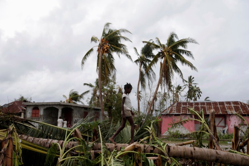 The hurricane, described by UN officials as "the worst humanitarian crisis to hit Haiti since the 2010 earthquake", whipped Cuba and Haiti with 230 km per hour winds on Tuesday. The president of Haiti's Provisional Electoral Council, Leopold Berlanger, said a new date for the presidential elections would be announced by next Wednesday at the latest after talks between various interested parties, France 24 reported. Hurricane Matthew,Haiti hurricane Matthew,Hurricane Matthew pics,Hurricane Matthew images,Hurricane Matthew stills,Hurricane Matthew pictures,Hurricane Matthew photos,Actres Hurricane Matthew,monster Hurricane Matthew