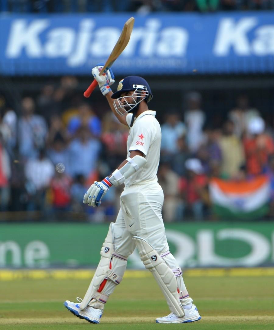 Resuming the post-tea session at 456/3, Kohli and Rahane again paced up their innings as they hit the Kiwi bowlers all around the park before off-spinner Jeetan Patel broke their 365-run partnership by trapping Kohli leg-before for 211. Kohli's 366-ball innings was laced with 20 boundaries. Virat Kohli,Ajinkya Rahane,Virat Kohli and Ajinkya Rahane,India vs New Zealand,India vs New Zealand Test series,India vs New Zealand score,India vs New Zealand 3rd Test,India vs New Zealand pics,India vs New Zealand images,India vs New Zealand photos,Indi