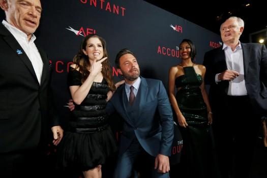 Cast member Ben Affleck (3rd L) poses with co-star Anna Kendrick (2nd L), as cast members J.K. Simmons (L), Cynthia Addai-Robinson and John Lithgow watch, at the premiere of 