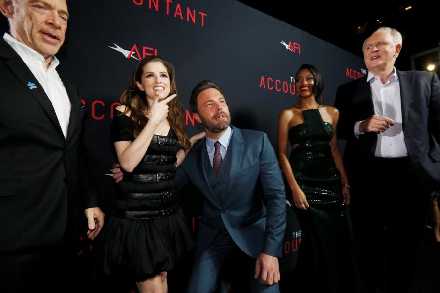 Cast member Ben Affleck (3rd L) poses with co-star Anna Kendrick (2nd L), as cast members J.K. Simmons (L), Cynthia Addai-Robinson and John Lithgow watch, at the premiere of "The Accountant" at the TCL Chinese theatre in Hollywood, California. Ben Affleck,Anna Kendrick,The Accountant,The Accountant premiere show,Celebs at The Accountant premiere show,The Accountant premiere show pics,The Accountant premiere show images,The Accountant premiere show photos,The Accountant premiere show stills,The