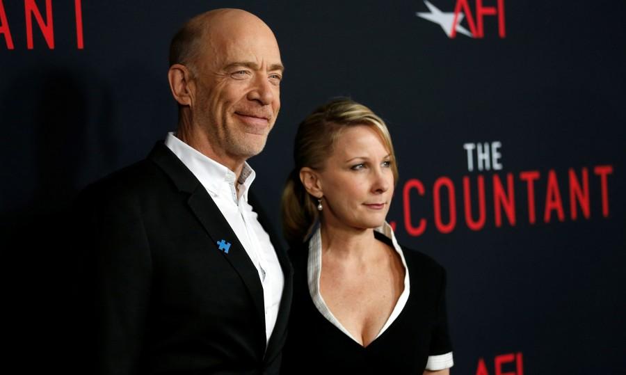 Cast member J.K. Simmons and his wife Michelle Schumacher at the premiere of "The Accountant" at the TCL Chinese theatre in Hollywood, California. Ben Affleck,Anna Kendrick,The Accountant,The Accountant premiere show,Celebs at The Accountant premiere show,The Accountant premiere show pics,The Accountant premiere show images,The Accountant premiere show photos,The Accountant premiere show stills,The