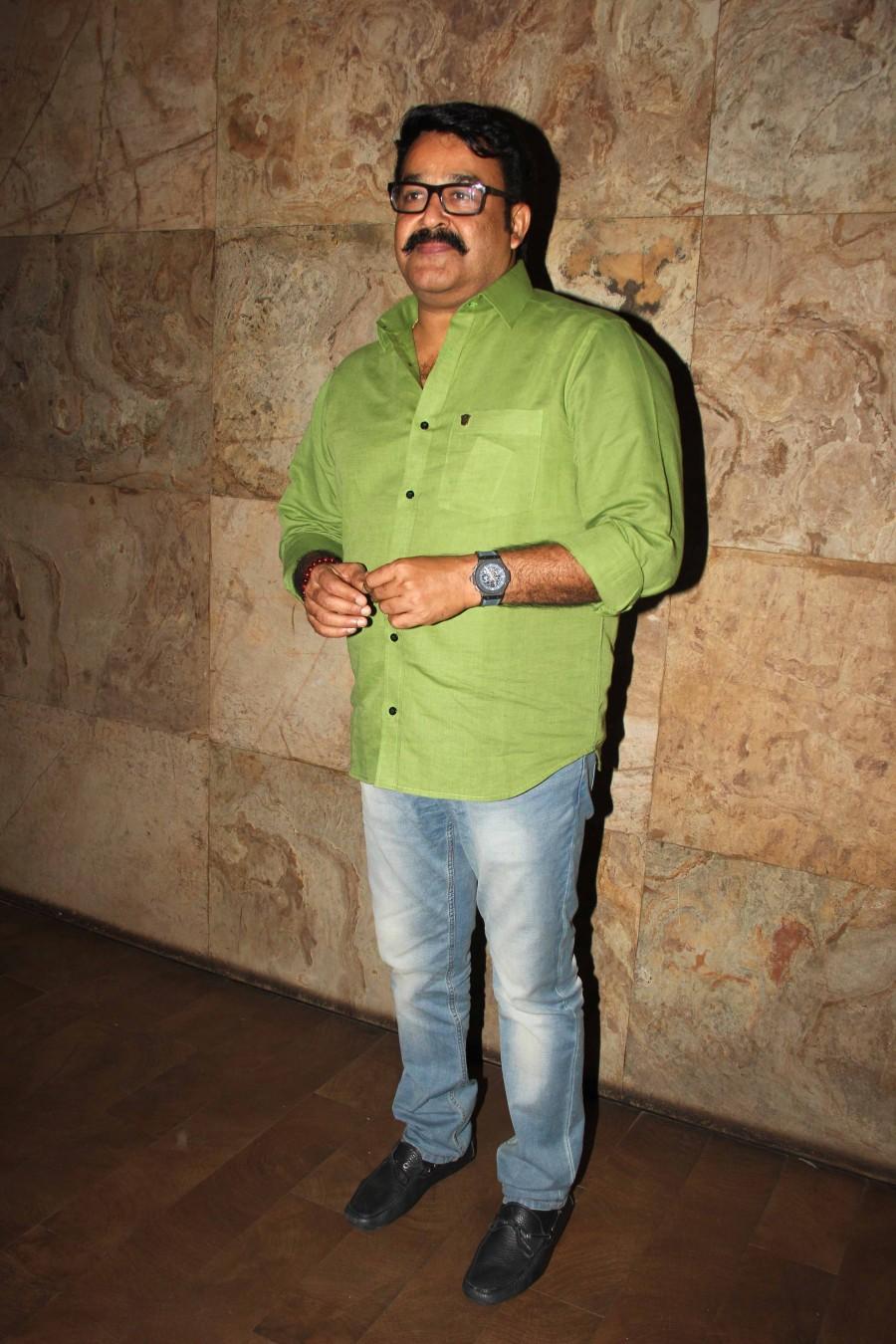 One of the reasons for the stupendous success of "Pulimurugan" is the actor takes on a tiger and this has enthralled not just his fans but even the ordinary film-goers. Pulimurugan,Mohanlal,Pulimurugan special screening pics,Pulimurugan special screening images,Pulimurugan special screening photos,Pulimurugan special screening stills,Pulimurugan special screening pictures