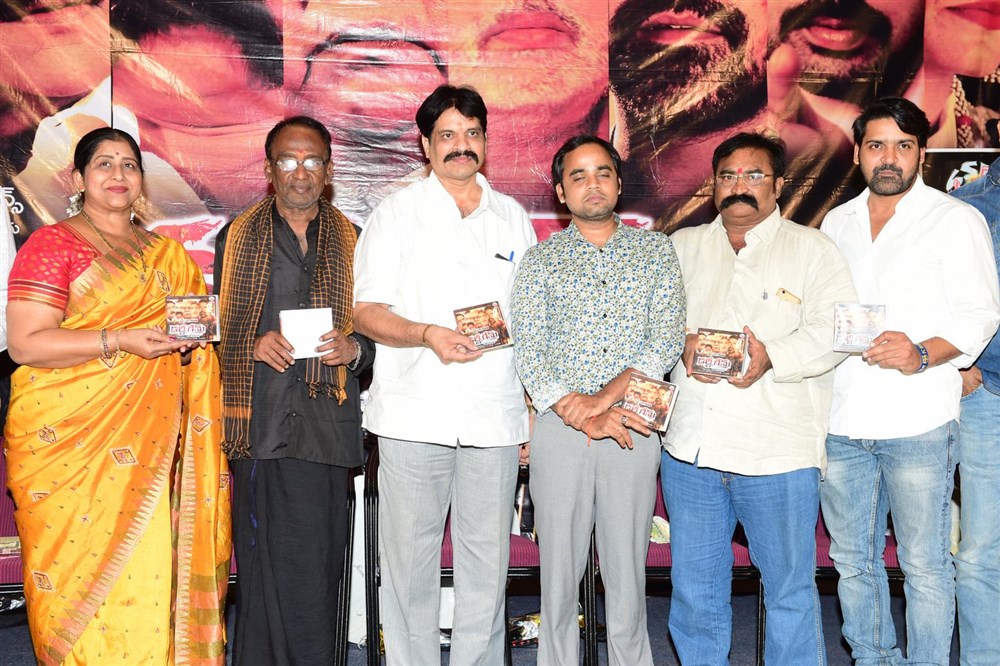 Telugu movie Dirty Game Audio Launch event held at Hyderabad. Celebs like Kavitha, GV Sudhakar Naidu, Sunil Kashyap, Sagar, Akkapeddi Venkateshwara Sharma, T Prasanna Kumar, Nandini Kapoor and others graced the event. Dirty Game Audio Launch,Dirty Game Audio,Dirty Game music,Dirty Game music launch,Kavitha,GV Sudhakar Naidu,Sunil Kashyap,Sagar,Akkapeddi Venkateshwara Sharma,T Prasanna Kumar,Nandini Kapoor,Dirty Game Audio Launch pics,Dirty Game Audio Launch images,Dirt
