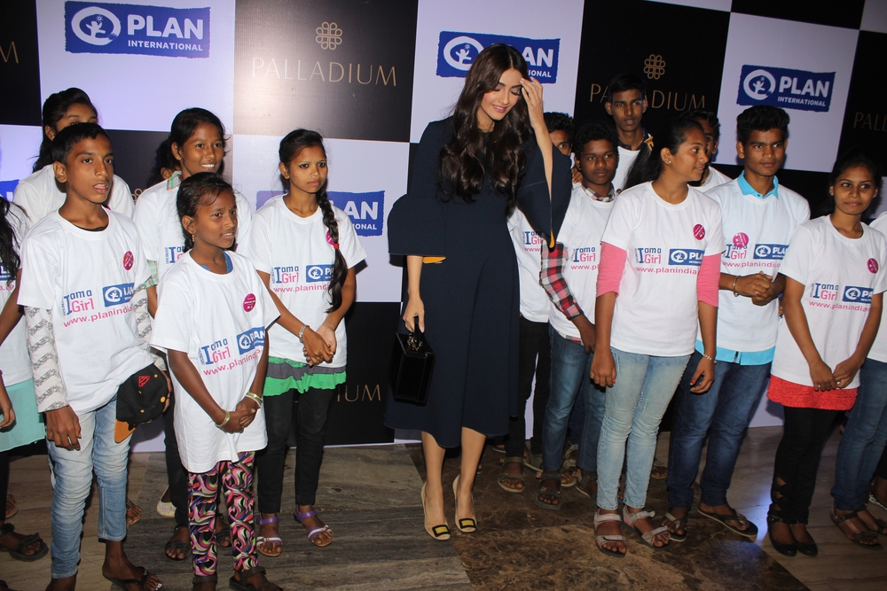 Photos of Bollywood actor Sonam Kapoor with children of Plan India during the 7th Anniversary celebration of Palladium organised by Plan India. Sonam Kapoor,7th Anniversary Celebration of Indian Leading Artists,Sonam Kapoor latest pics,Sonam Kapoor latest images,Sonam Kapoor latest photos,Sonam Kapoor latest stills,Sonam Kapoor latest pictures