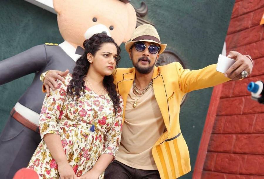 D. Imman has composed the film's music and background score. The cinematography is provided by Rajarathinam and Praveen Antony edited the film. Kiccha Sudeep,Nithya Menen,Kotigobba 2,Kotikokkadu movie stills,Kotikokkadu movie pics,Kotikokkadu movie images,Kotikokkadu movie photos,Kotikokkadu movie pictures,Kotikokkadu,Telugu movie Kotikokkadu