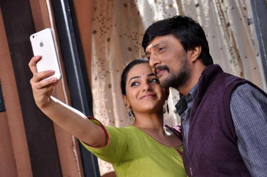 Kiccha Sudeep, Nithya Menen's Kotikokkadu movie stills. Kiccha Sudeep,Nithya Menen,Kotigobba 2,Kotikokkadu movie stills,Kotikokkadu movie pics,Kotikokkadu movie images,Kotikokkadu movie photos,Kotikokkadu movie pictures,Kotikokkadu,Telugu movie Kotikokkadu