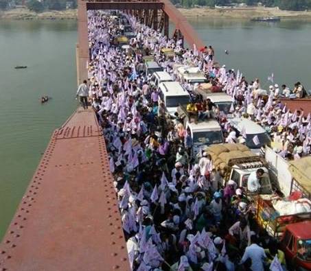 At least 18 persons, including women, were killed and hundreds injured in a stampede at a religious gathering in Varanasi on Saturday, police said. Varanasi,Varanasi Stampede,Varanasi Stampede pics,Varanasi Stampede images,Varanasi Stampede photos,Varanasi Stampede stills,Varanasi Stampede pictures,Rajghat Bridge,Rajghat Bridge near Varanasi