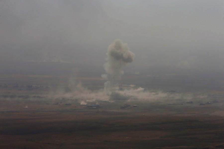 Smoke rises from clashes in the east of Mosul during clashes with Islamic State militants, Iraq. Battle for Mosul begins,Battle for Mosul,Islamic State,Iraqi forces,Iraqi city,IS begins,Mosul,Mosul Battle,gunfire and car bombs,Iraqi attack on Mosul begins