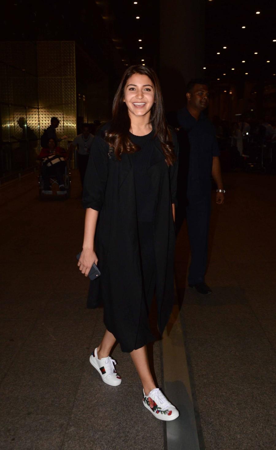Photos of Bollywood actress Anushka Sharma returns back post The Ring's shoot. Anushka Sharma,Anushka Sharma returns The Ring's shoot,The Ring,actress Anushka Sharma,Anushka Sharma snapped at Airport,Anushka Sharma latet pics,Anushka Sharma latet imgaes,Anushka Sharma latet photos,Anushka Sharma latet stills,Anushka Sharma late