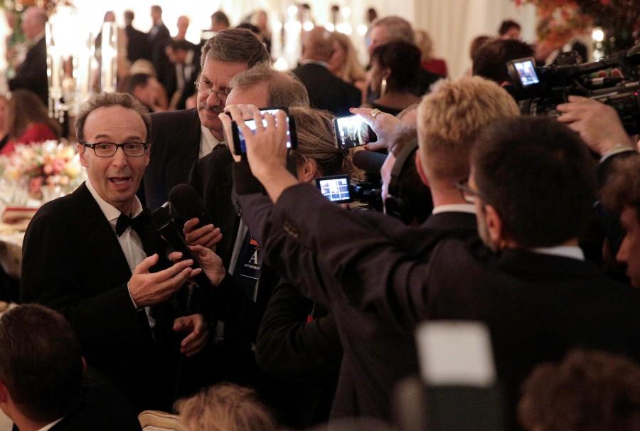 Italian actor Roberto Benigni (L) speaks to members of the media. Barack Obama,Obamas' last state dinner,Obamas' last state dinner at White House,White House,last state dinner,Michelle Obama,Matteo Renzi,Agnese Landini,Obamas' last state dinner pics,Obamas' last state dinner images,Obamas' last