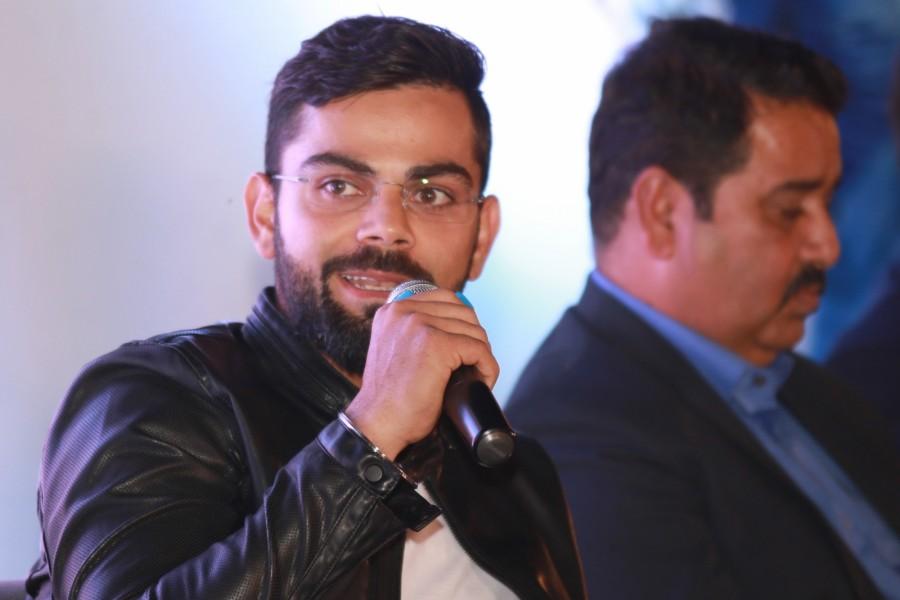 India Test captain Virat Kohli during the book release "Driven: The Virat Kohli Story" authored by Vijay Lokapally in New Delhi. Virat Kohli,Anil Kumble,coach Anil Kumble,Ravi Shastri,Kapil Dev,Virender Sehwag,Driven: The Virat Kohli Story,The Virat Kohli Story