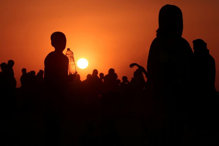 Iraqis who fled violence in Mosul gather as they reach Syria, near the Iraqi border, in Hasaka Governorate. Mosul,Iraqi forces,Islamic State,assault on Mosul,Mosul offensive,Mosul civilians,Fleeing Mosul,Assault on ISIS in Mosul,Assault on ISIS,ISIS