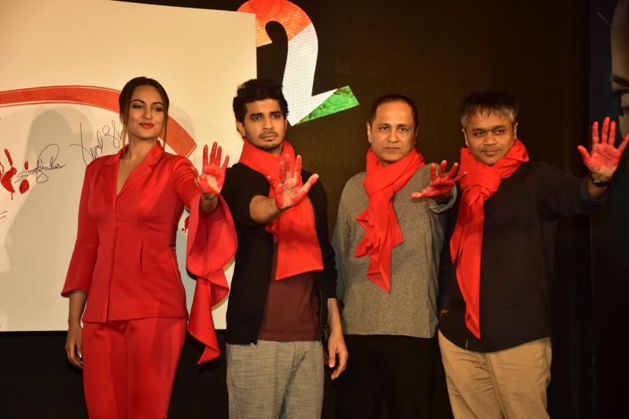 The track, which reflects India's resilience, is a tribute to our unsung heroes, who sacrifice their lives without giving second thoughts to whether their efforts will ever be recognised. Interestingly, John has also lent his voice to the number. His hard-hitting dialogues fuse beautifully with the flow of the song giving a great start to the music album. John Abraham,Sonakshi Sinha,Tahir Bhasin,Rang Lal,Rang Lal song launch,Rang Lal song,Force 2,bollywood movie Force 2,Rang Lal music launch,Rang Lal video