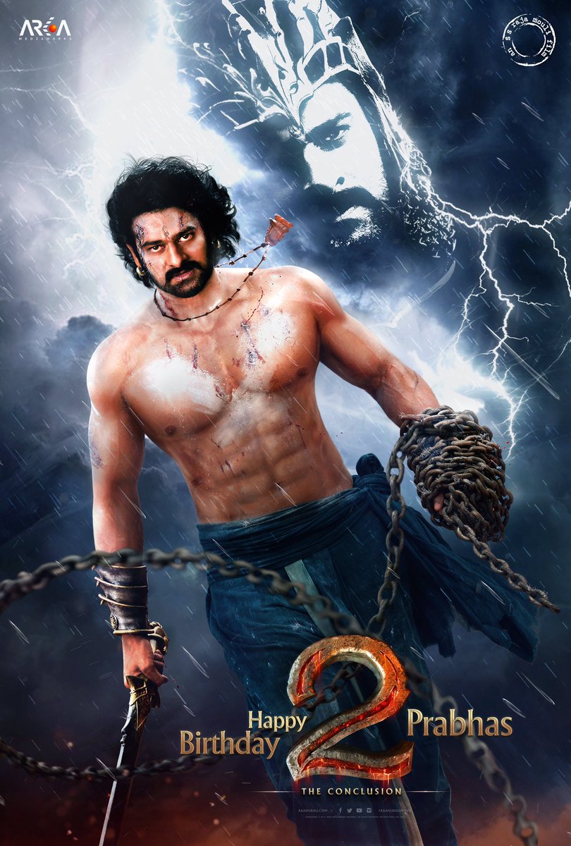Once you put on the headgear, you can tour the sets of the film and experience all the grandeur in 360 degrees. The Baahubali team consisting of Director S. S Rajamouli, Prabhas, Tamannaah Bhatia and Anushka Shetty presented the first look of their upcoming film at Jio MAMI Film Festival aka Mumbai Film Festival 2016. Baahubali 2 first look,Baahubali 2,Baahubali 2 first look poster,Baahubali 2 poster,Baahubali 2 movie first look,Prabhas,actor Prabhas,Prabhas birthday,Prabhas Baahubali 2 first look,Telugu actor Prabhas