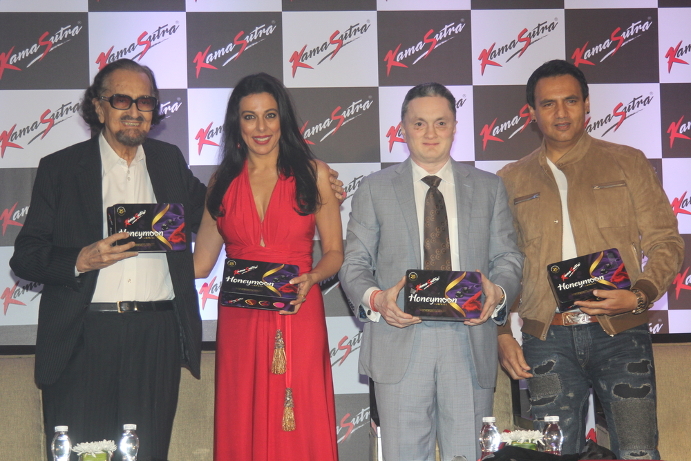 Theater personality and ad filmmaker Alyque Padamsee, actor Pooja Bedi, Gautam Singhania, CMD, Raymond Group and model Marc Robinson during the launch of KamaSutra Honeymoon Surprise Pack, in Mumbai, on Oct 21, 2016. Pooja Bedi,KamaSutra Honeymoon Surprise Pack,KamaSutra Honeymoon,Honeymoon Surprise Pack,KamaSutra,kamasutra condoms,kamasutra condom,Pooja Bedi launches KamaSutra Honeymoon Surprise Pack