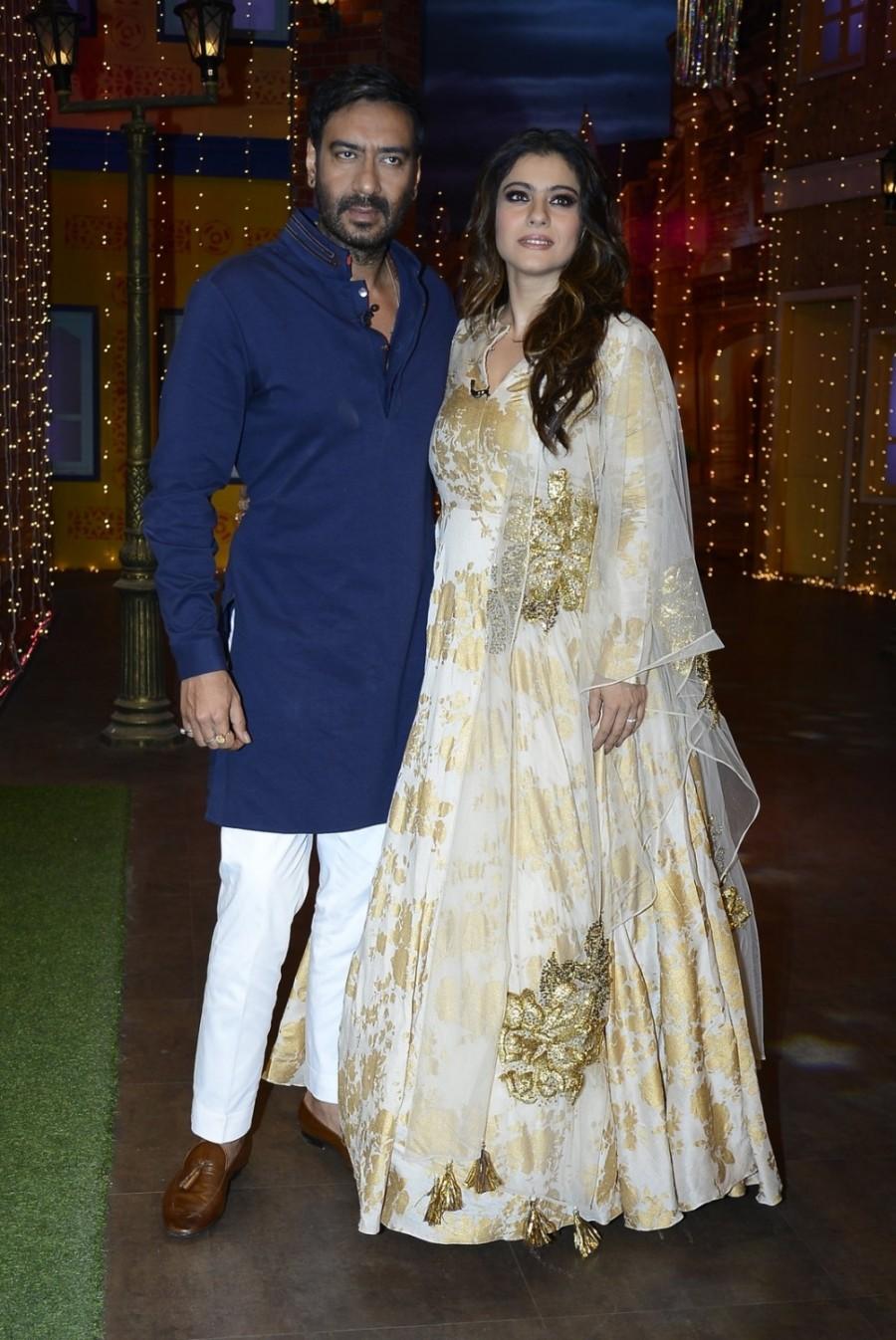 Photos of Bollywood Actors Ajay Devgan and Kajol during the promotion of film Shivaay on the sets of The Kapil Sharma Show, in Mumbai on Oct 22, 2016. Ajay Devgan,Kajol,Ajay Devgan and Kajol,Shivaay at Kapil Sharma Show,Kapil Sharma Show,Shivaay movie promotion,Shivaay promotion,Ajay Devgan and Kajol at Kapil Sharma Show,Shivaay on the sets of The Kapil Sharma Show