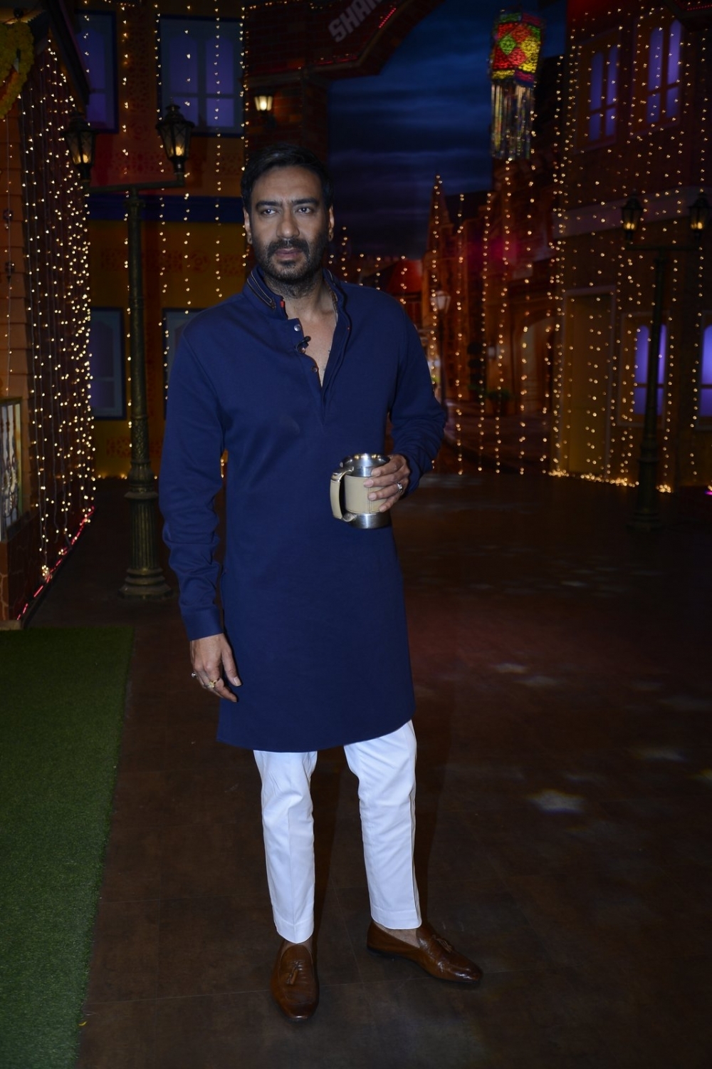 Actor Ajay Devgan during the promotion of film Shivaay on the sets of The Kapil Sharma Show, in Mumbai on Oct 22, 2016. Ajay Devgan,Kajol,Ajay Devgan and Kajol,Shivaay at Kapil Sharma Show,Kapil Sharma Show,Shivaay movie promotion,Shivaay promotion,Ajay Devgan and Kajol at Kapil Sharma Show,Shivaay on the sets of The Kapil Sharma Show