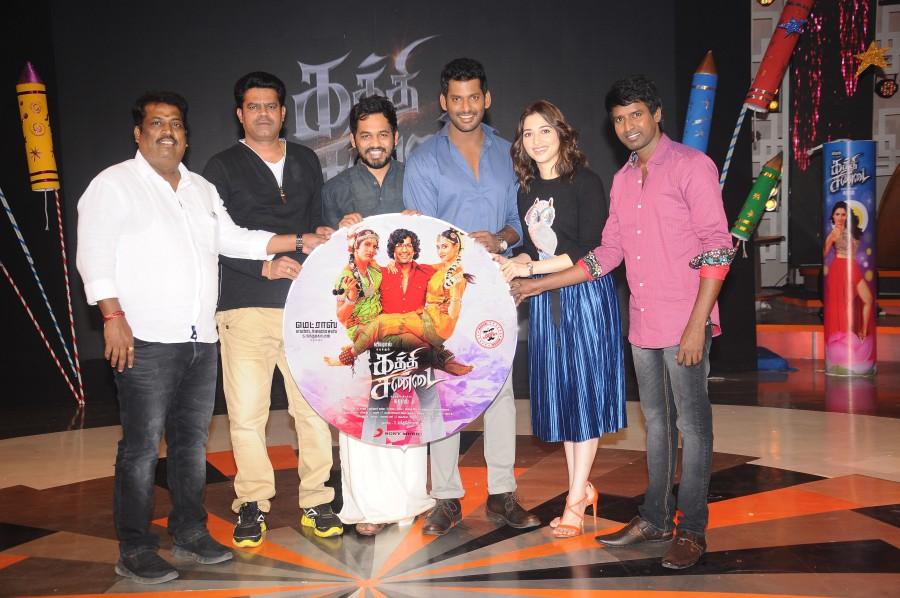 Tamil movie Kaththi Sandai Audio Launch event held at Suriyan FM, Chennai. Celebs like Vishal, Tamannaah, Director Suraj, Music Director Hiphop Tamizha Aadhi, Comedy actor Soori, Producer S. Nanthagopal and others graced the event. Vishal,Tamannaah,Kathi Sandai audio launch,Kathi Sandai audio,Kathi Sandai music,Kathi Sandai music launch,Kathi Sandai audio launch pics,Kathi Sandai audio launch images,Kathi Sandai audio launch photos,Kathi Sandai audio launch stills,Kathi Sandai audio