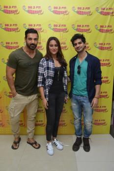 Photos of Bollywood actor John Abraham, actress Sonakshi Sinha and Tahir Raj Bhasin to promote Force 2 at Radio Mirchi Studio.