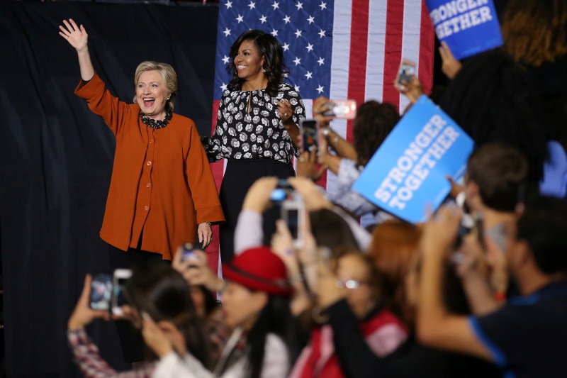 U.S. Democratic presidential candidate Hillary Clinton arrives to a campaign rally accompanied by U.S. first lady Michelle Obama in Winston-Salem, North Carolina, U.S. US election 2016,US election,Hillary Clinton,Michelle Obama,Hillary Clinton and Michelle Obama,First lady Michelle Obama,Michelle Obama campaigns with Clinton,Michelle Obama joins Hillary Clinton