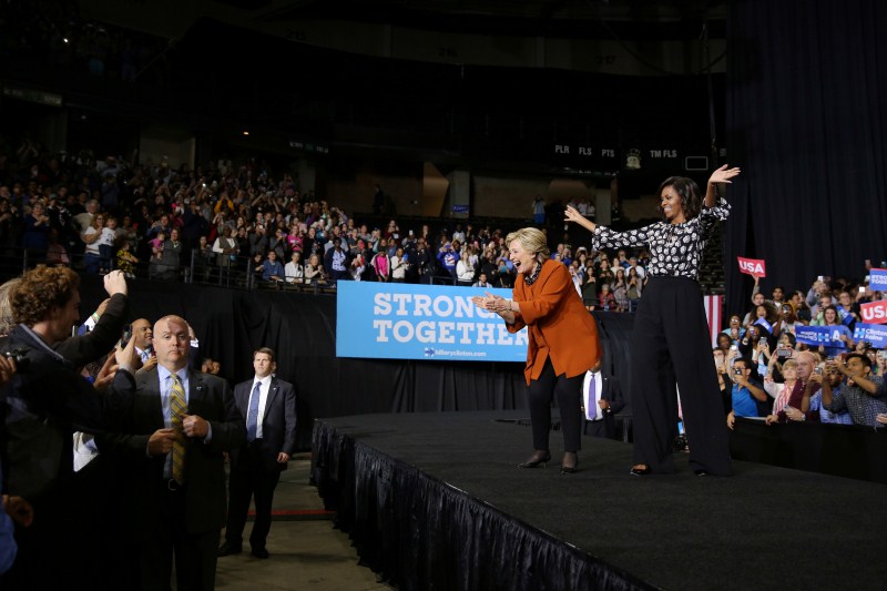 U.S. Democratic presidential candidate Hillary Clinton arrives to a campaign rally accompanied by U.S. first lady Michelle Obama in Winston-Salem, North Carolina, U.S. US election 2016,US election,Hillary Clinton,Michelle Obama,Hillary Clinton and Michelle Obama,First lady Michelle Obama,Michelle Obama campaigns with Clinton,Michelle Obama joins Hillary Clinton